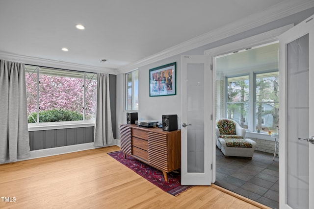 home office featuring ornamental molding, recessed lighting, and wood finished floors