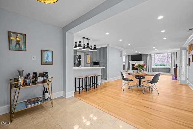 dining space featuring recessed lighting, baseboards, and visible vents
