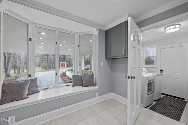 laundry room featuring baseboards, ornamental molding, washer / clothes dryer, and marble finish floor