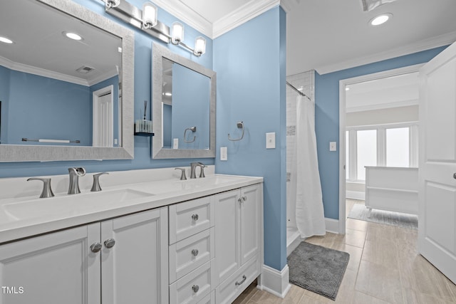 full bathroom featuring a sink, ornamental molding, recessed lighting, and curtained shower