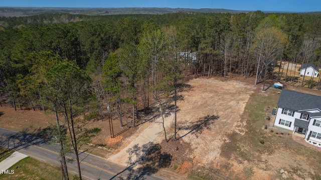 aerial view featuring a forest view