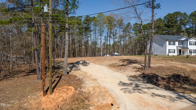 view of road featuring driveway