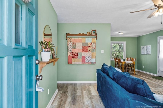 6407 Kimridge Rd, Fayetteville, NC 28314 - living room with baseboards, wood finished floors, and ceiling fan