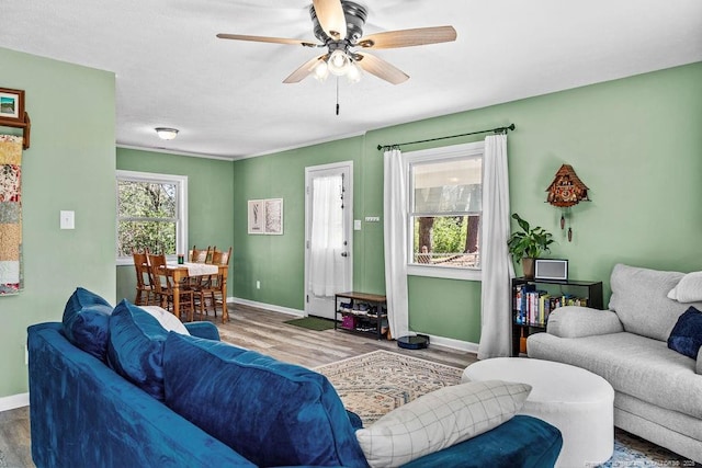 6407 Kimridge Rd, Fayetteville, NC 28314 - living room with baseboards, a ceiling fan, and wood finished floors