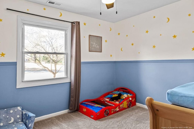 6407 Kimridge Rd, Fayetteville, NC 28314 - bedroom with visible vents, baseboards, carpet, and a ceiling fan