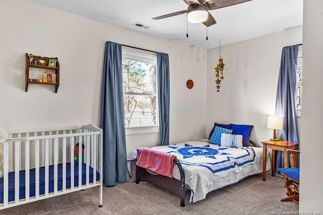 6407 Kimridge Rd, Fayetteville, NC 28314 - bedroom featuring visible vents, ceiling fan, and carpet floors