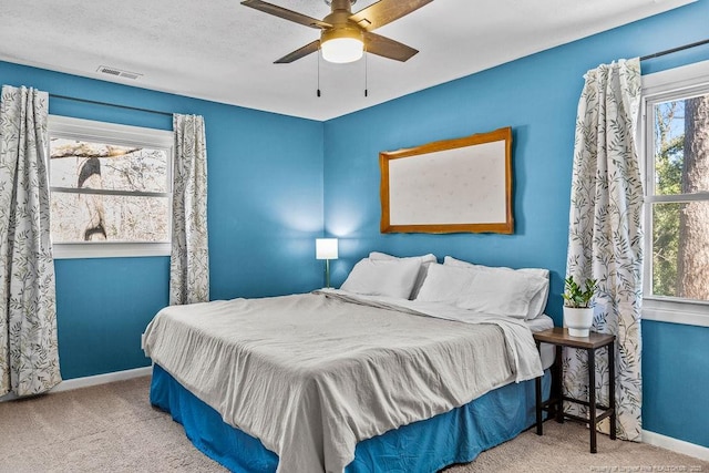 6407 Kimridge Rd, Fayetteville, NC 28314 - bedroom featuring visible vents, carpet flooring, a ceiling fan, and baseboards
