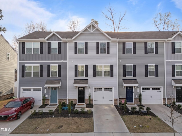 1558 Indigo Creek Dr, Zebulon, NC 27597 - multi unit property featuring concrete driveway, a garage, and stone siding