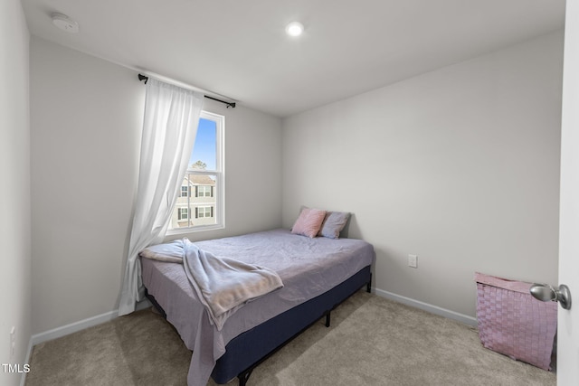 1558 Indigo Creek Dr, Zebulon, NC 27597 - bedroom featuring baseboards and carpet floors