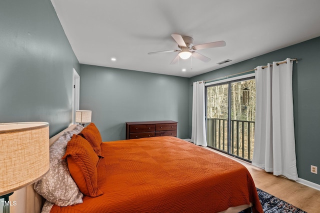 bedroom featuring a ceiling fan, wood finished floors, visible vents, baseboards, and recessed lighting