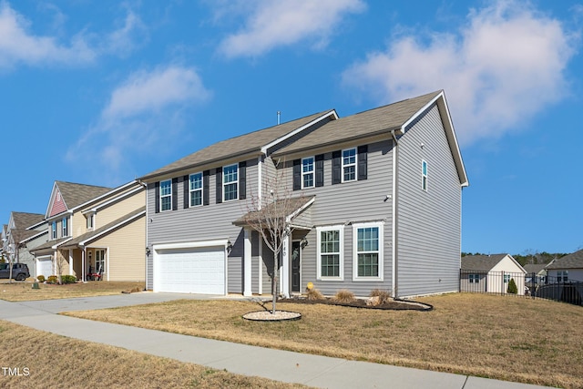 view of front of house featuring a residential view, a front lawn, concrete driveway, fence, and an attached garage