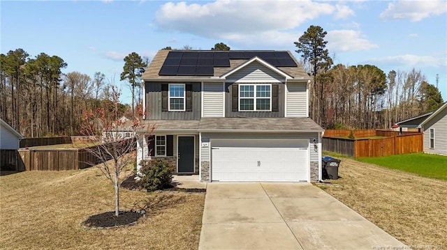 524 Mineral Spring Ln, Fuquay Varina, NC 27526 - traditional-style house featuring driveway, fence, board and batten siding, a front lawn, and a garage