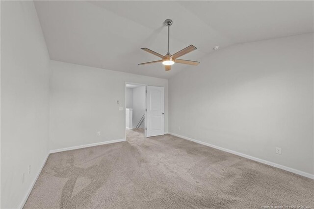 524 Mineral Spring Ln, Fuquay Varina, NC 27526 - unfurnished room with carpet, baseboards, vaulted ceiling, and ceiling fan