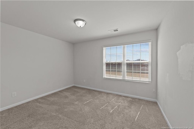 524 Mineral Spring Ln, Fuquay Varina, NC 27526 - unfurnished room featuring carpet, baseboards, and visible vents