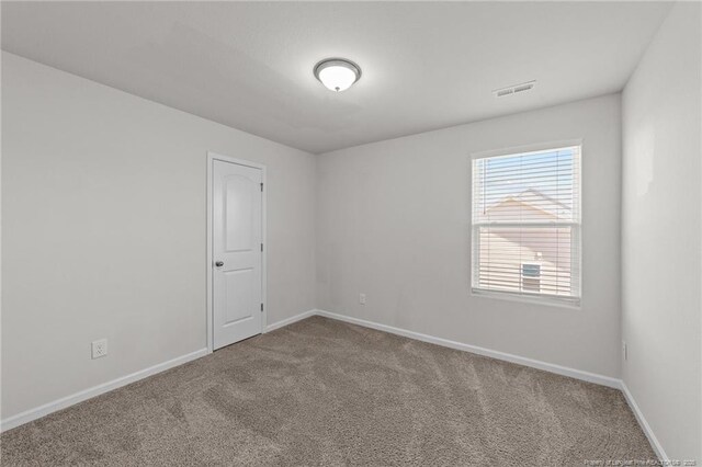 524 Mineral Spring Ln, Fuquay Varina, NC 27526 - carpeted empty room featuring baseboards and visible vents