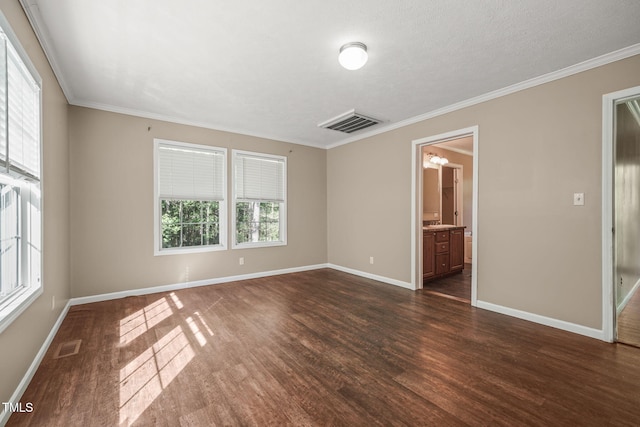 234 Rolling Hills Rd, Skipwith, VA 23968 - empty room with visible vents, baseboards, ornamental molding, and dark wood-style flooring