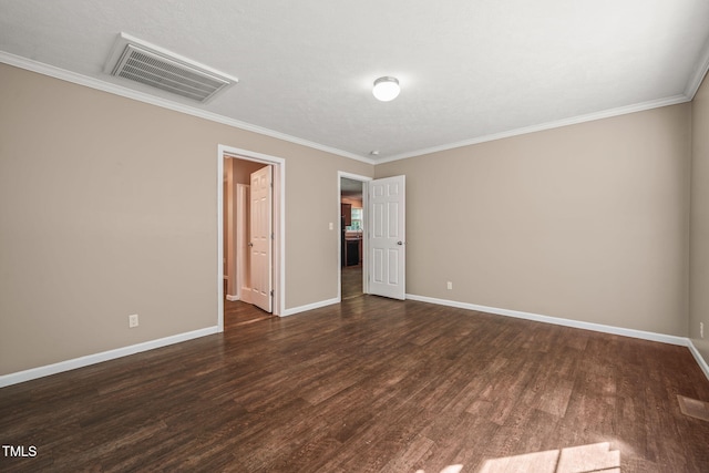 234 Rolling Hills Rd, Skipwith, VA 23968 - empty room with crown molding, baseboards, visible vents, and dark wood-style flooring