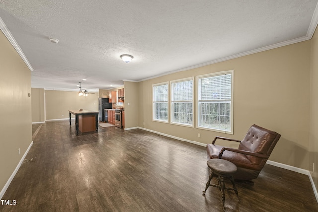 234 Rolling Hills Rd, Skipwith, VA 23968 - living area featuring baseboards, a textured ceiling, dark wood-style flooring, and crown molding