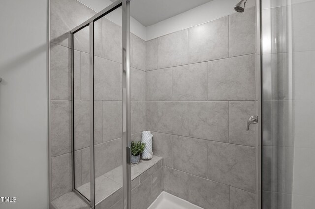 bathroom with a stall shower
