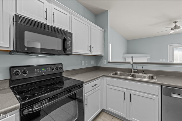 kitchen featuring ceiling fan, white cabinetry, a sink, light tile patterned floors, and black appliances