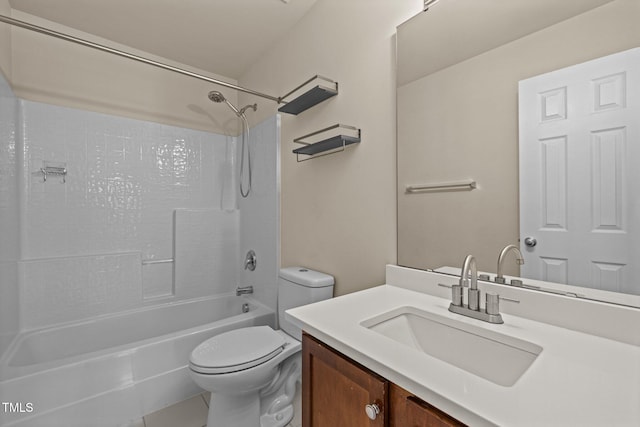 bathroom featuring vanity, tile patterned flooring, washtub / shower combination, and toilet
