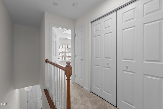 2713 Wyntercrest Ln, Durham, NC 27713 - hallway featuring carpet flooring and an upstairs landing