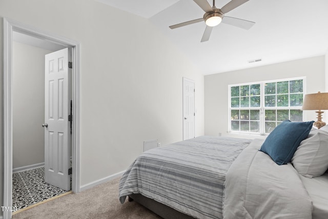 2713 Wyntercrest Ln, Durham, NC 27713 - carpeted bedroom featuring baseboards, ceiling fan, vaulted ceiling, and visible vents