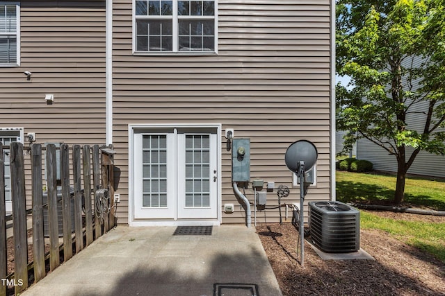 2713 Wyntercrest Ln, Durham, NC 27713 - view of patio / terrace featuring central air condition unit and fence