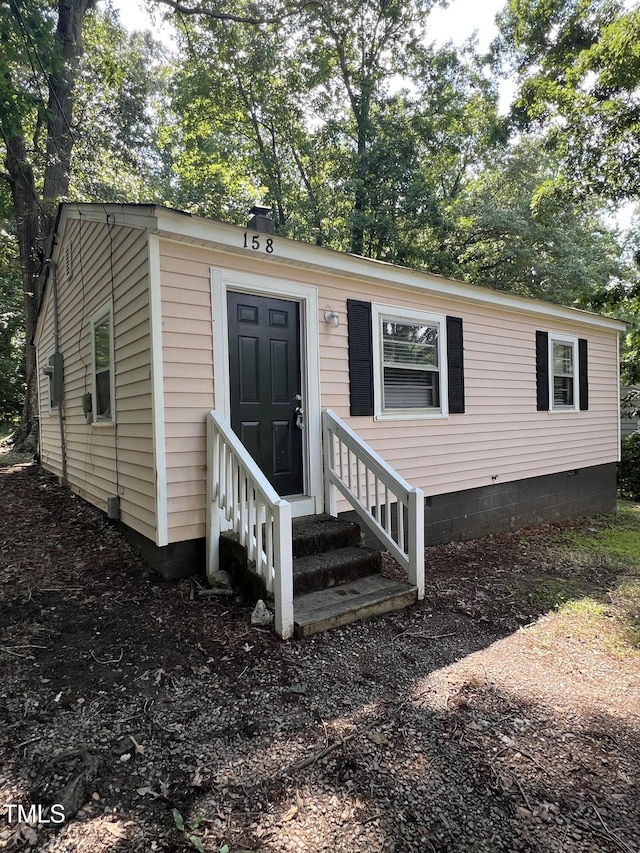 158 Torain St, Hillsborough, NC 27278 - view of front facade featuring entry steps and crawl space