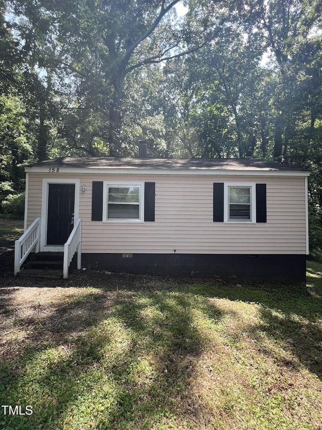 158 Torain St, Hillsborough, NC 27278 - view of front of house featuring crawl space, entry steps, and a front lawn
