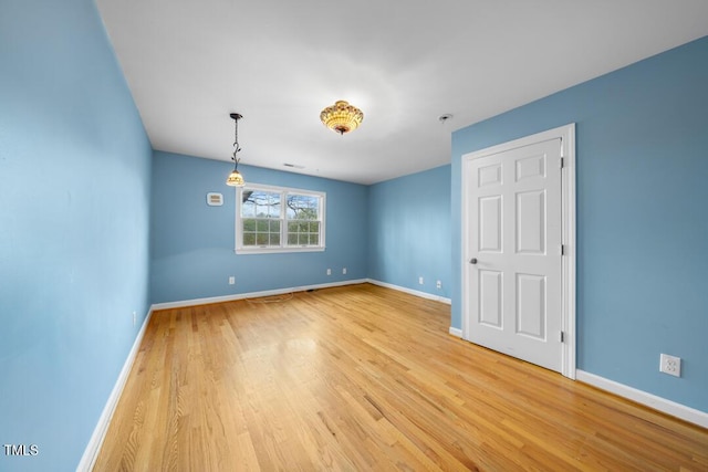4811 New Sharon Church Rd, Hillsborough, NC 27278 - unfurnished room with light wood-style flooring and baseboards