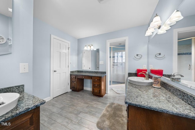 4811 New Sharon Church Rd, Hillsborough, NC 27278 - full bath featuring a stall shower, two vanities, a chandelier, and baseboards