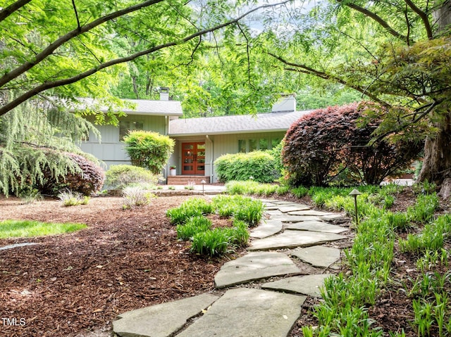 3915 Nottaway Rd, Durham, NC 27707 - view of front of home with a chimney and french doors