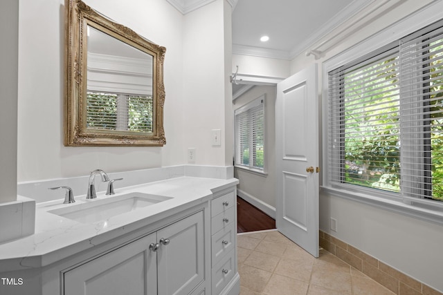 3915 Nottaway Rd, Durham, NC 27707 - bathroom featuring vanity, tile patterned flooring, ornamental molding, baseboards, and recessed lighting