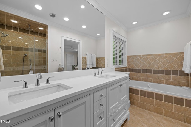 3915 Nottaway Rd, Durham, NC 27707 - bathroom with a shower stall, a bath, double vanity, tile patterned flooring, and recessed lighting