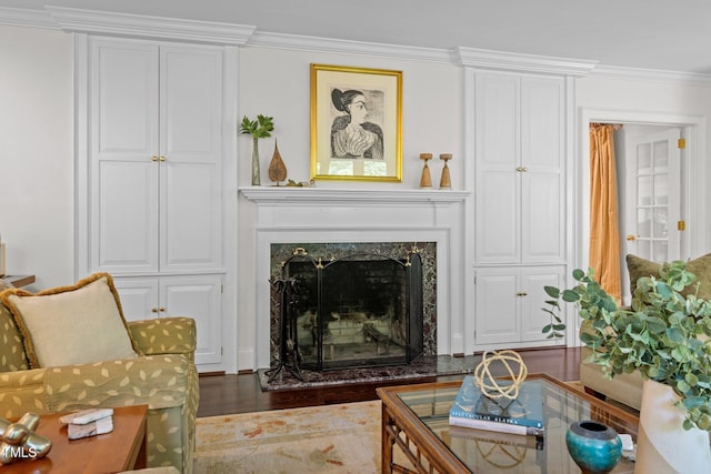 3915 Nottaway Rd, Durham, NC 27707 - living room with ornamental molding, a high end fireplace, and wood finished floors