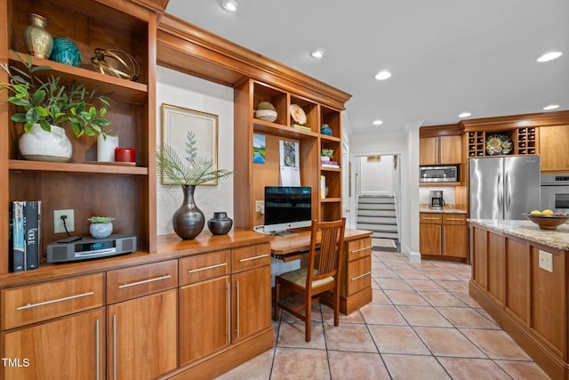 3915 Nottaway Rd, Durham, NC 27707 - home office featuring light tile patterned flooring, recessed lighting, and built in study area