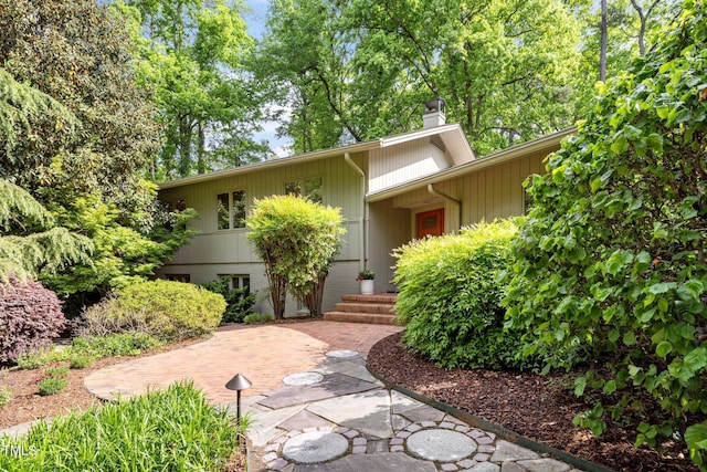 3915 Nottaway Rd, Durham, NC 27707 - view of front facade with a chimney