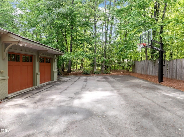 3915 Nottaway Rd, Durham, NC 27707 - view of patio featuring a garage