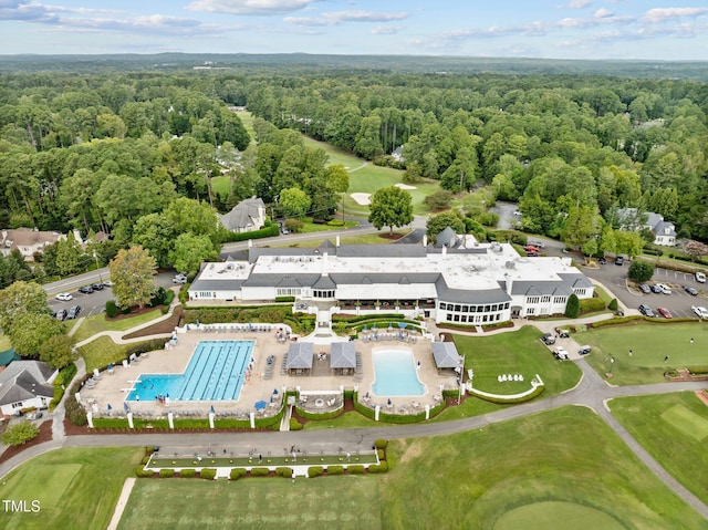 3915 Nottaway Rd, Durham, NC 27707 - drone / aerial view of a pool and a heavily wooded area