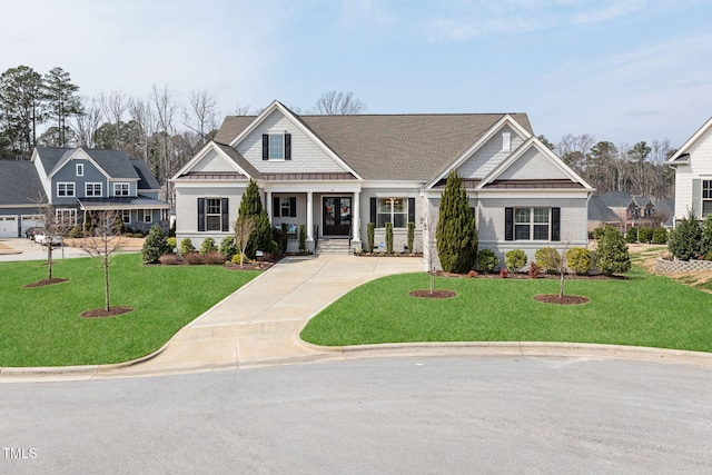 301 Rocking Ranch Ct, Cary, NC 27519 - view of front facade with a front lawn, driveway, and french doors