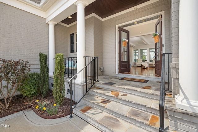 301 Rocking Ranch Ct, Cary, NC 27519 - property entrance with a porch and brick siding