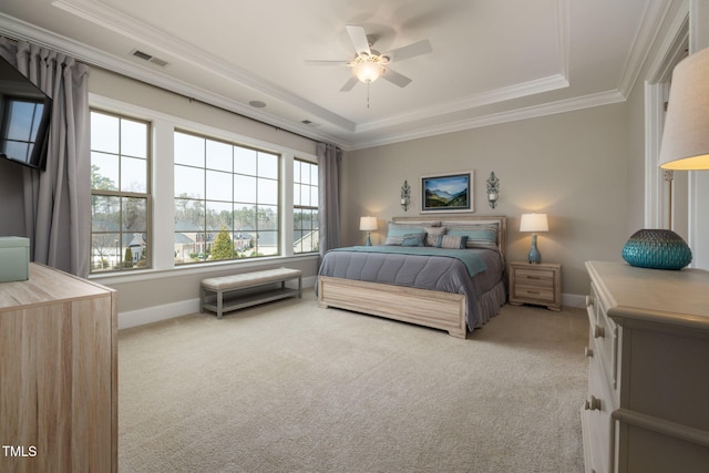 301 Rocking Ranch Ct, Cary, NC 27519 - bedroom featuring carpet flooring, multiple windows, crown molding, and a tray ceiling