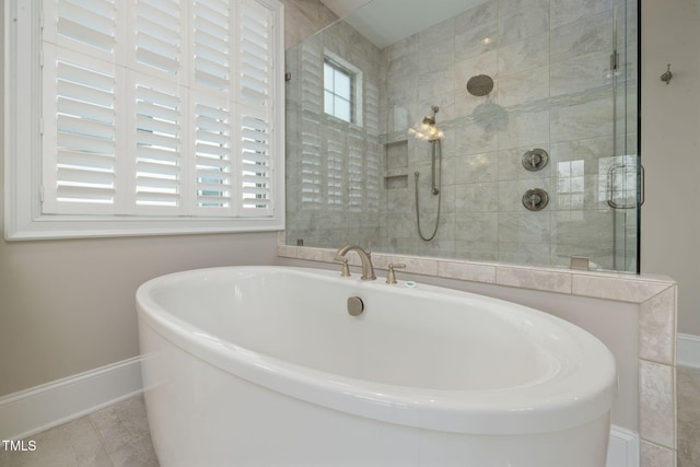 301 Rocking Ranch Ct, Cary, NC 27519 - full bathroom with a freestanding tub and a tile shower