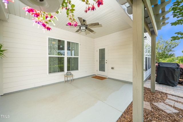 view of patio / terrace with a ceiling fan and grilling area
