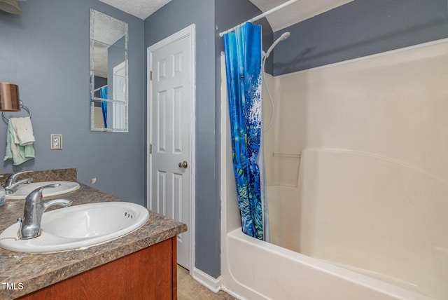 8404 Frenchorn Ln, Fayetteville, NC 28314 - full bathroom with a textured ceiling, double vanity, shower / tub combo, and a sink