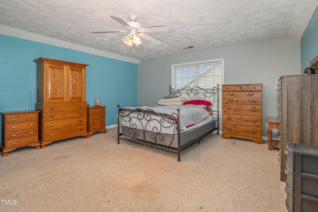 8404 Frenchorn Ln, Fayetteville, NC 28314 - bedroom featuring visible vents, light colored carpet, and a textured ceiling