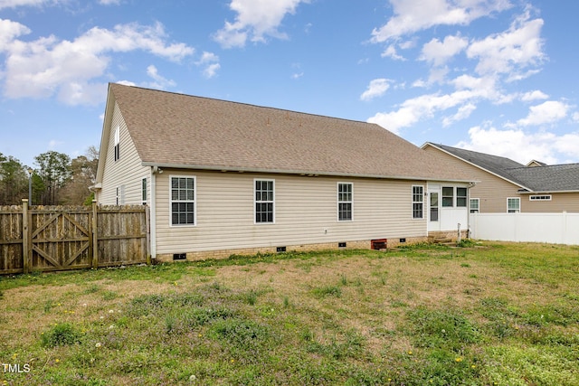8404 Frenchorn Ln, Fayetteville, NC 28314 - back of property with crawl space, a yard, a fenced backyard, and roof with shingles