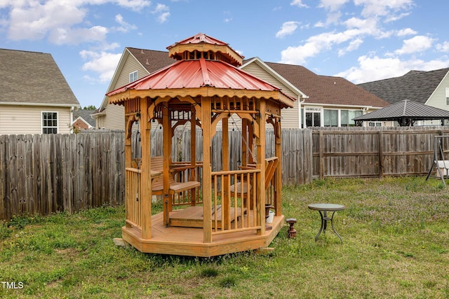8404 Frenchorn Ln, Fayetteville, NC 28314 - view of outbuilding featuring a gazebo and a fenced backyard