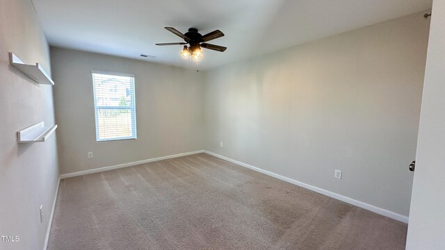 49 W Copenhaver Dr, Clayton, NC 27527 - carpeted spare room featuring a ceiling fan and baseboards